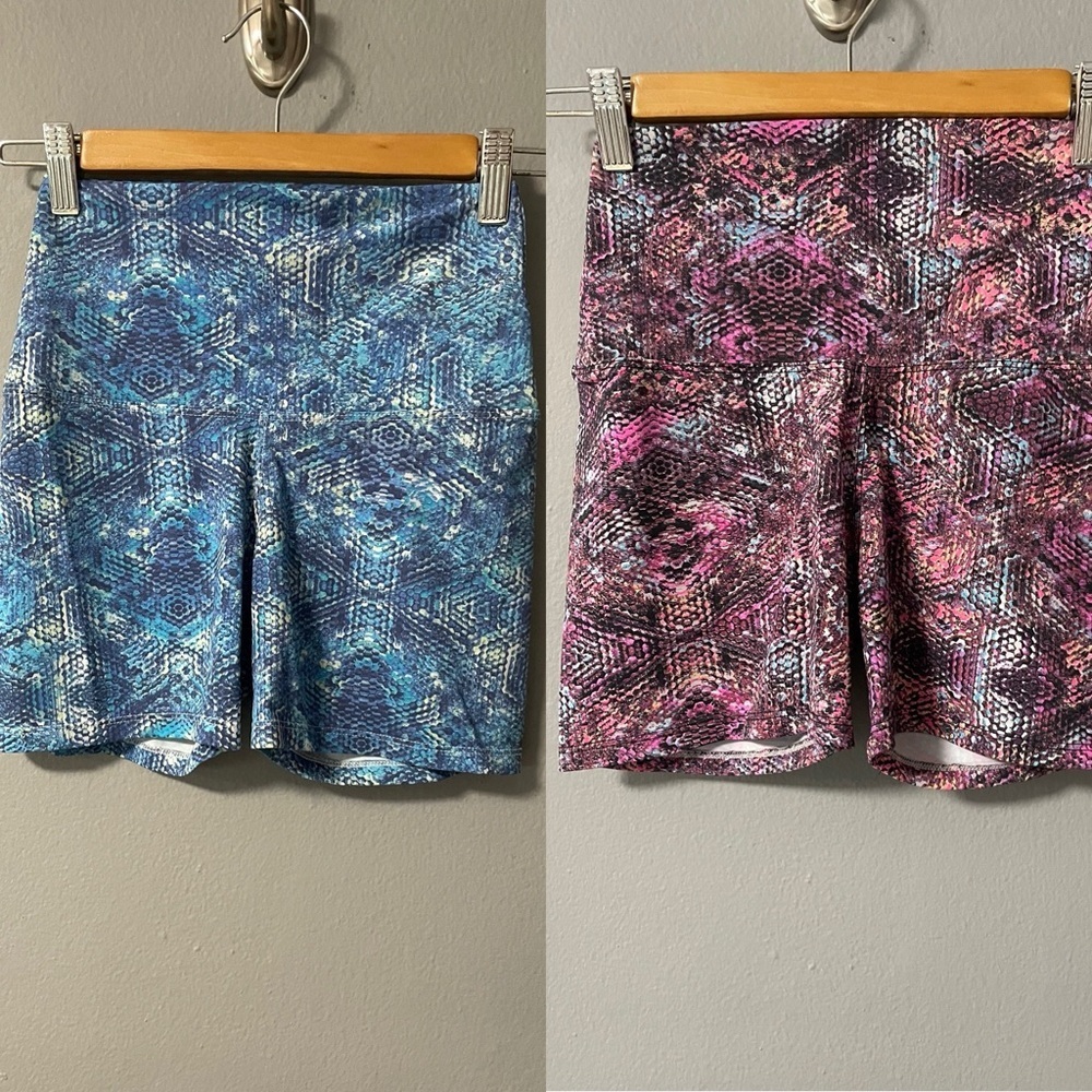 Pecado Concebido set of two high waisted animal print athletic shorts. X-Small
